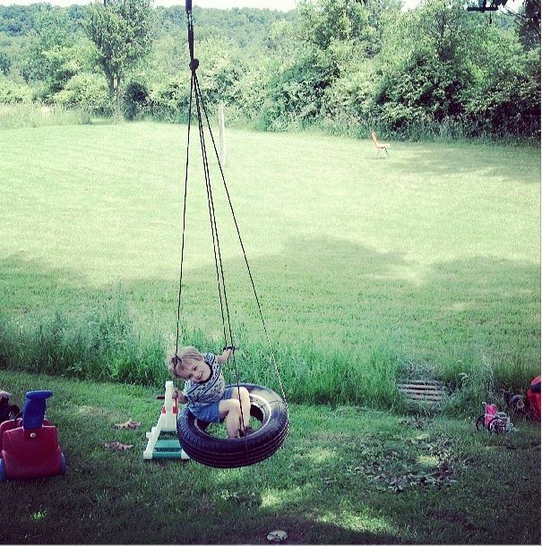  kid on tire swing