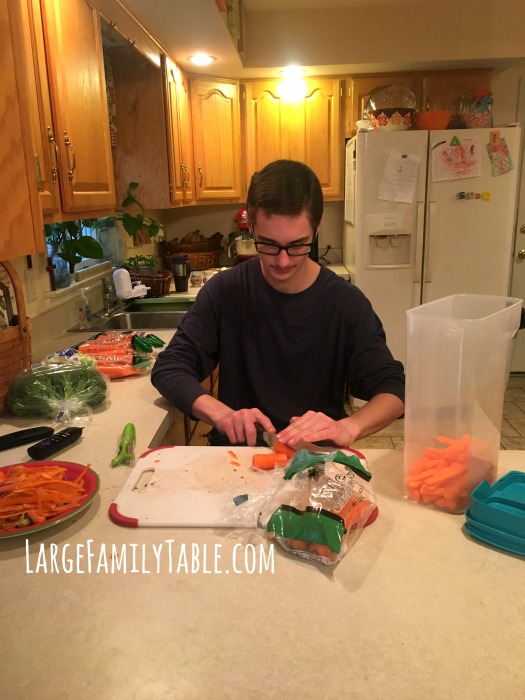 Chopping Carrots for Large Family Snacks