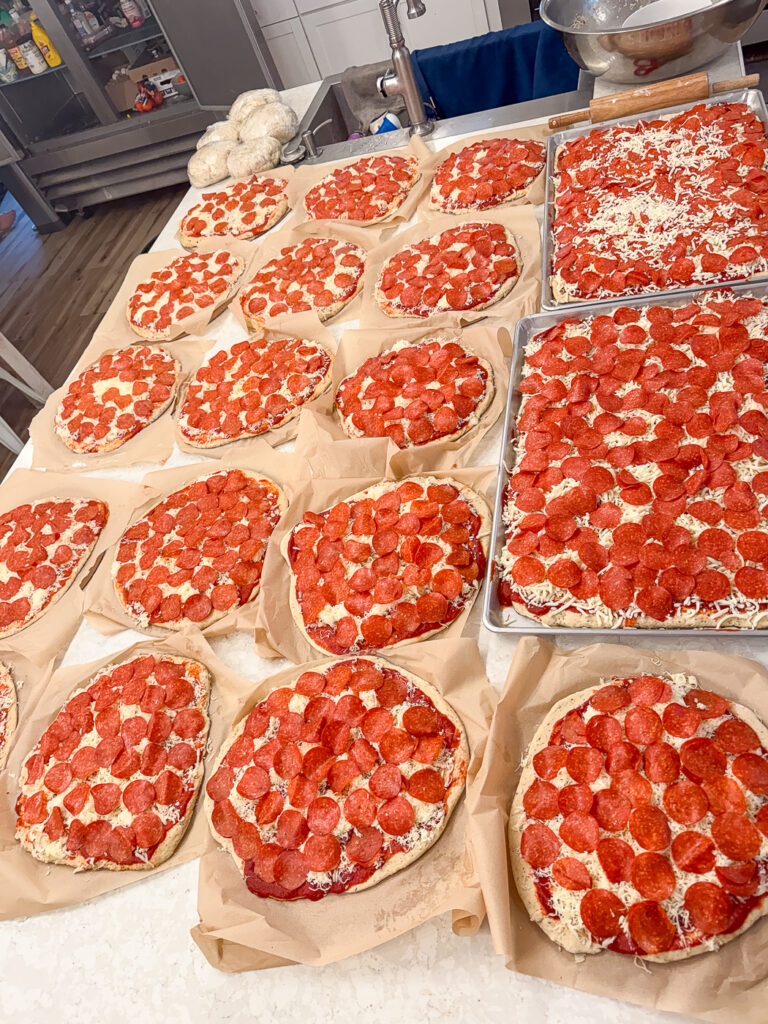 Big Batch Homemade Pizzas for the Freezer (27 pizzas!)